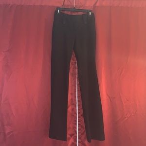 Black dressy mid-rise bootcut pants.